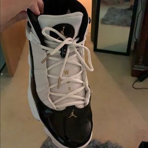 Jordan black and gold size 11